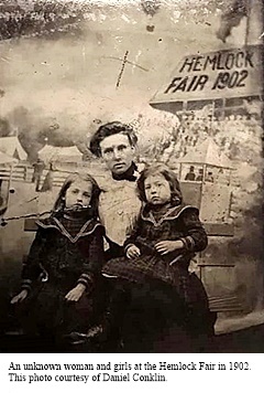 hcl_fair_hemlock_1902_woman_and_two_unknown_girls_at_hemlock_fair_resize240x320